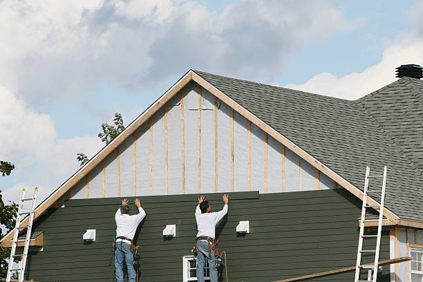 Professional Siding Contractor technician working in Port Republic, NJ